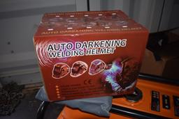 New in box auto darkening welding helmet