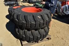 Pair of Titan trac loader tires with Kubota rims