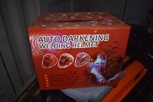 New in box auto darkening welding helmet