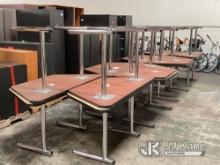 (El Cajon, CA) Qty 16 wooden trapezoid tables with metal legs. (Used) NOTE: This unit is being sold