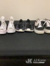 White pair of high top converse sneakers size mens seven | Pair of Black puma sneakers size womens 8