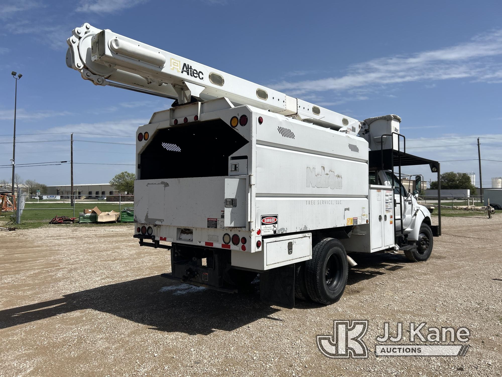 (Waxahachie, TX) Altec LR756, Over-Center Bucket Truck mounted behind cab on 2013 Ford F750 Chipper