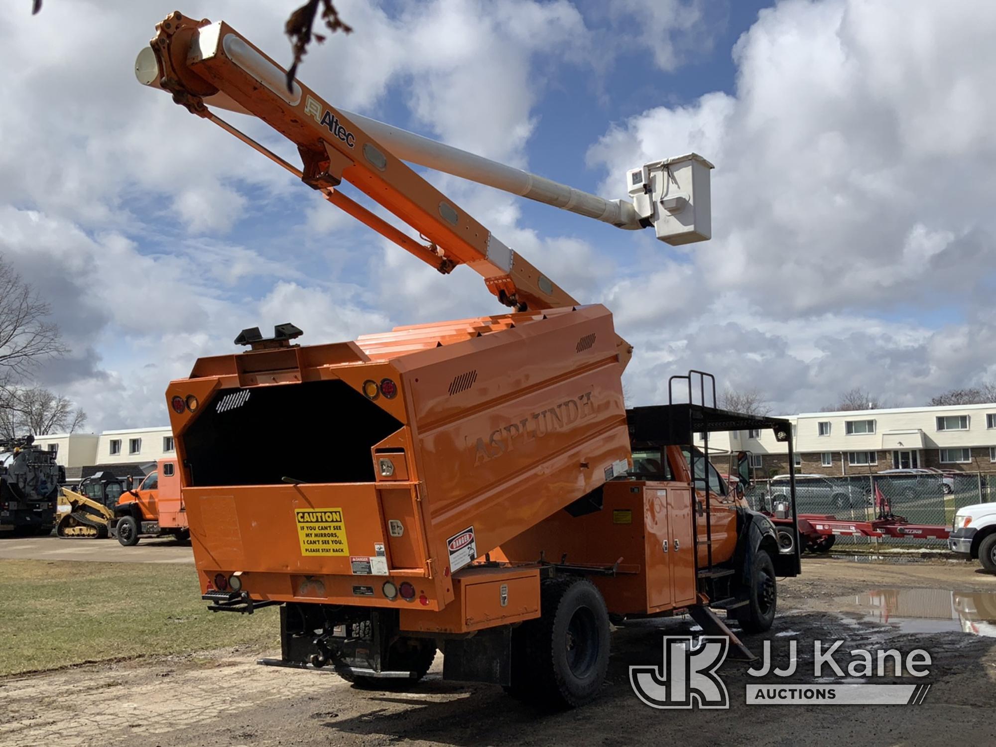 (Neenah, WI) Altec LR756, Over-Center Bucket Truck mounted behind cab on 2013 Ford F750 Chipper Dump