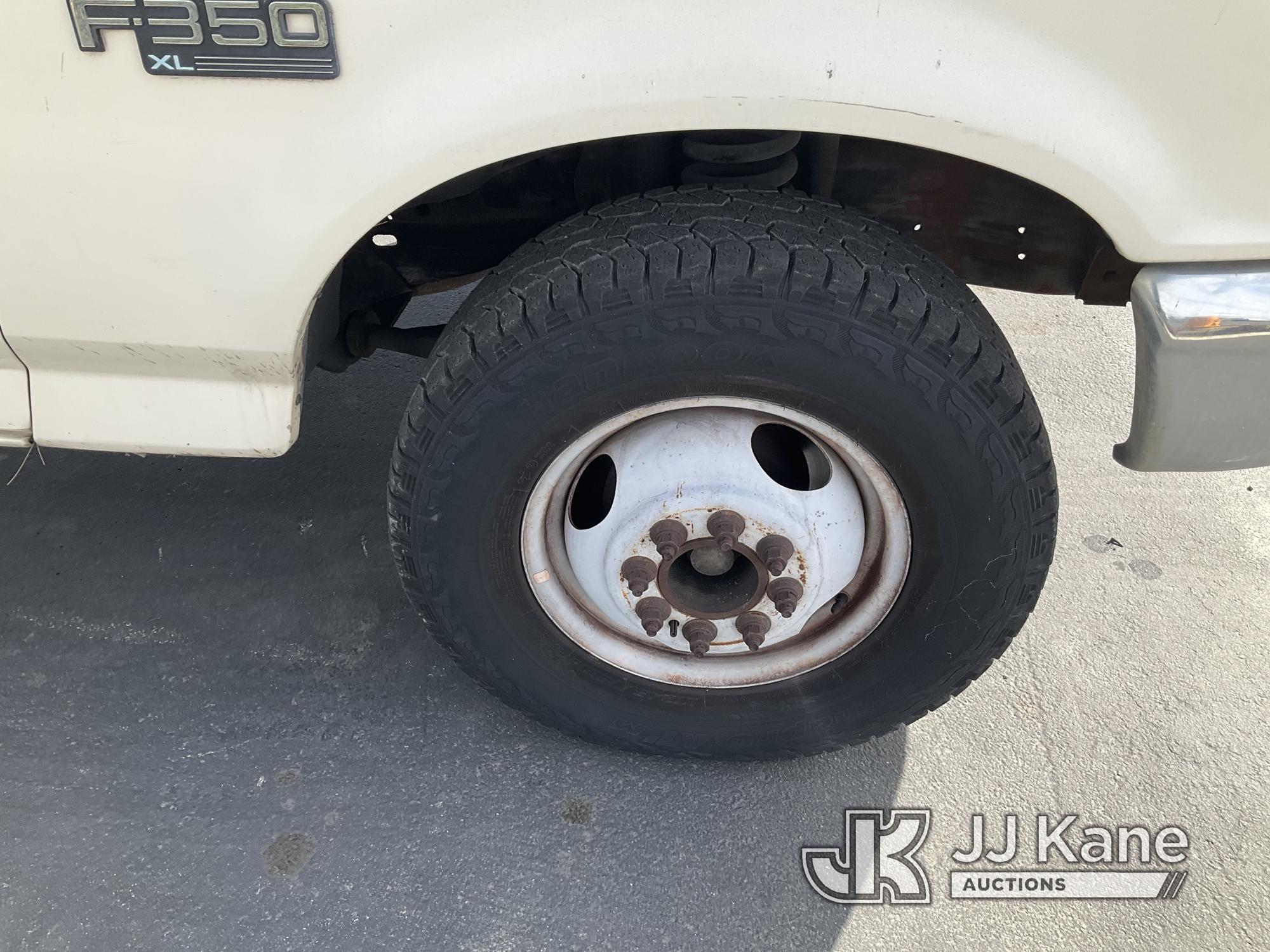 (Jurupa Valley, CA) 1997 Ford F-350 Stake Truck Runs & Moves With Jump, Bad Charging System