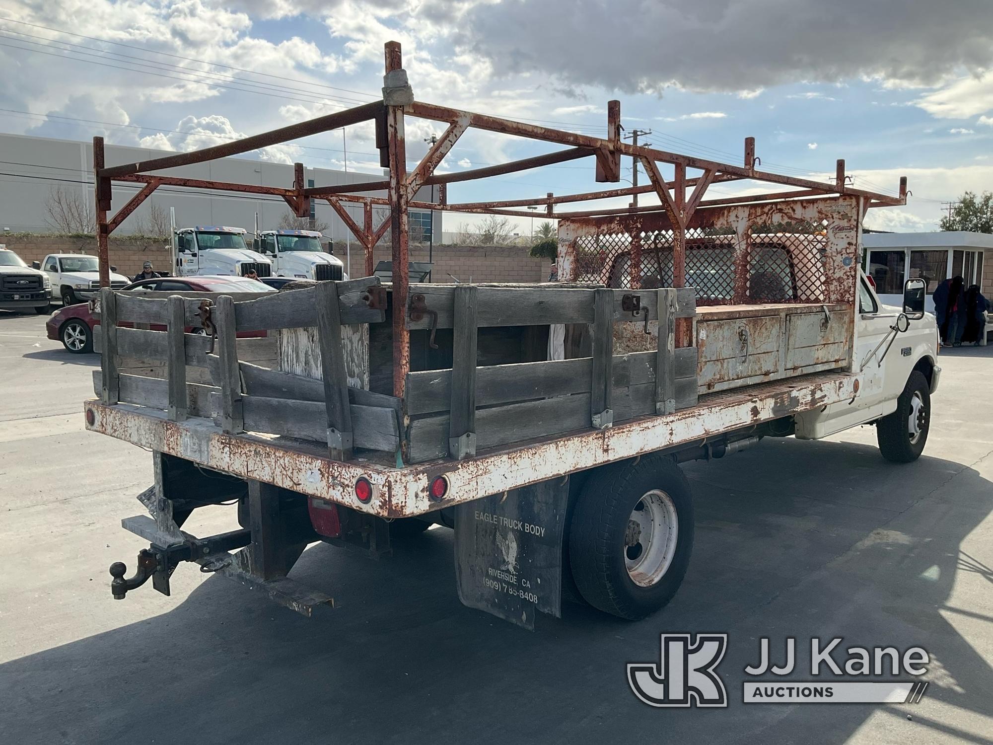 (Jurupa Valley, CA) 1997 Ford F-350 Stake Truck Runs & Moves With Jump, Bad Charging System