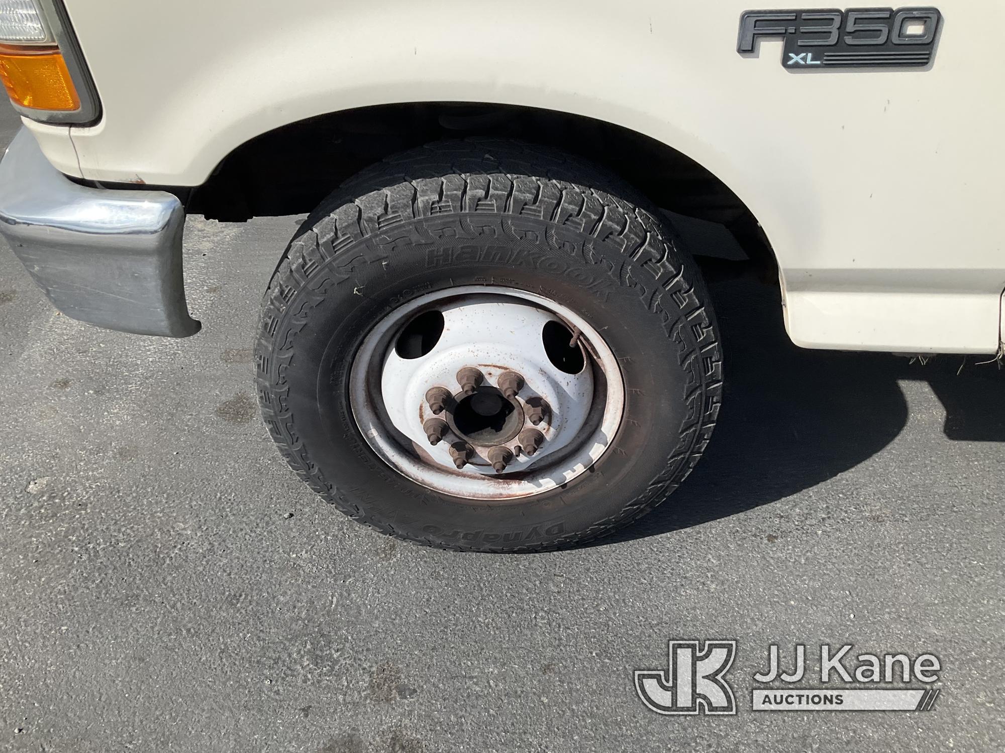 (Jurupa Valley, CA) 1997 Ford F-350 Stake Truck Runs & Moves With Jump, Bad Charging System