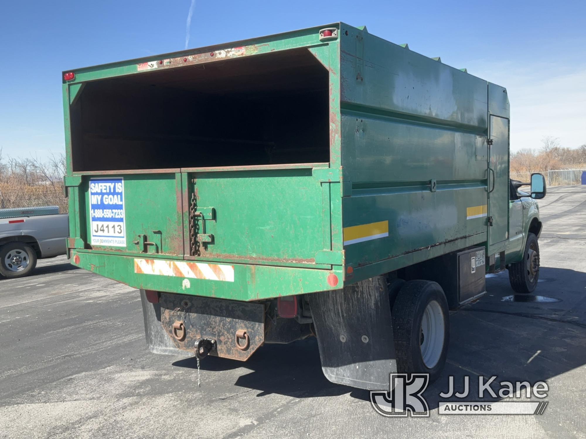 (Salt Lake City, UT) 1999 Ford F450 Chipper Dump Truck Not Running, Condition Unknown, No Batteries