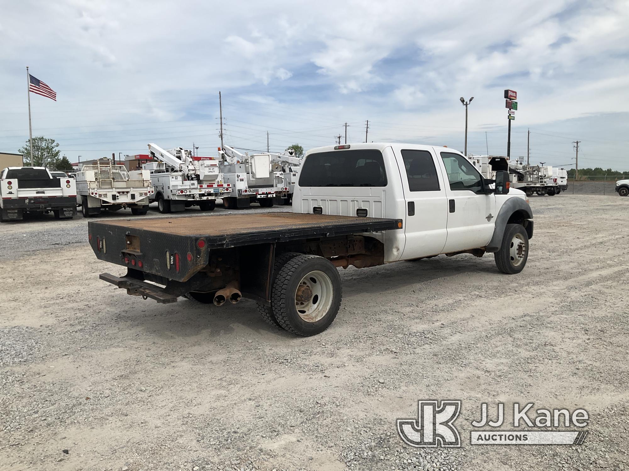 (Villa Rica, GA) 2011 Ford F550 4x4 Crew-Cab Flatbed Truck Runs & Moves) (Jump To Start, Body Damage