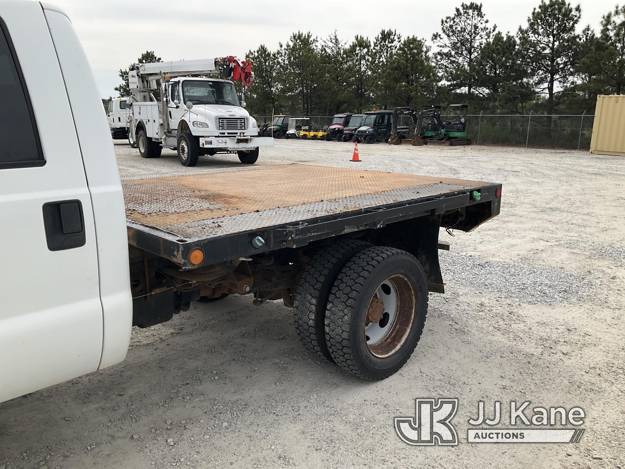 (Villa Rica, GA) 2011 Ford F550 4x4 Crew-Cab Flatbed Truck Runs & Moves) (Jump To Start, Body Damage