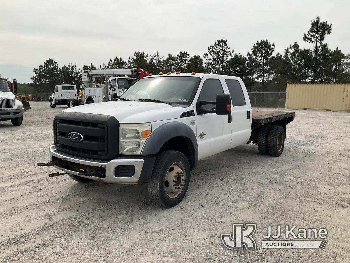 (Villa Rica, GA) 2011 Ford F550 4x4 Crew-Cab Flatbed Truck Runs & Moves) (Jump To Start, Body Damage