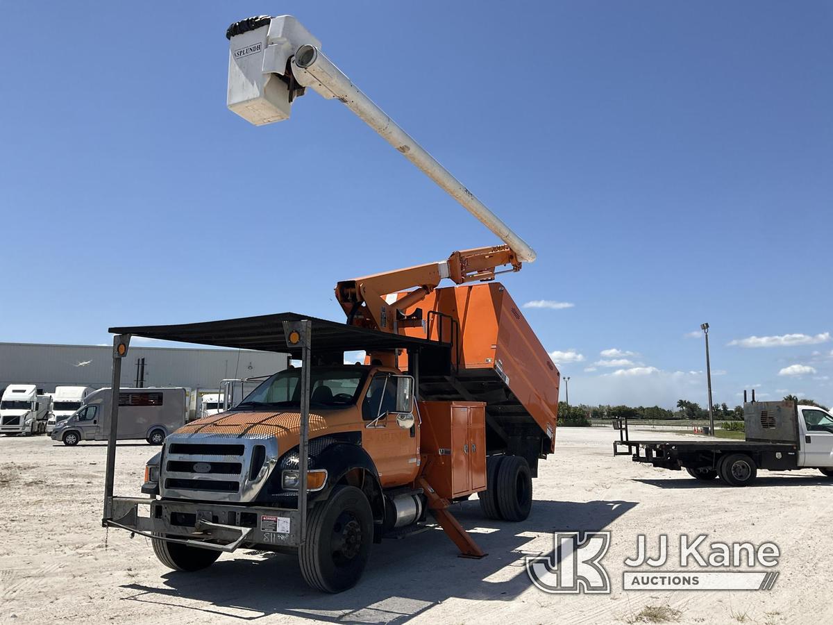 (Westlake, FL) Altec LR756, Over-Center Bucket Truck mounted behind cab on 2013 Ford F750 Chipper Du