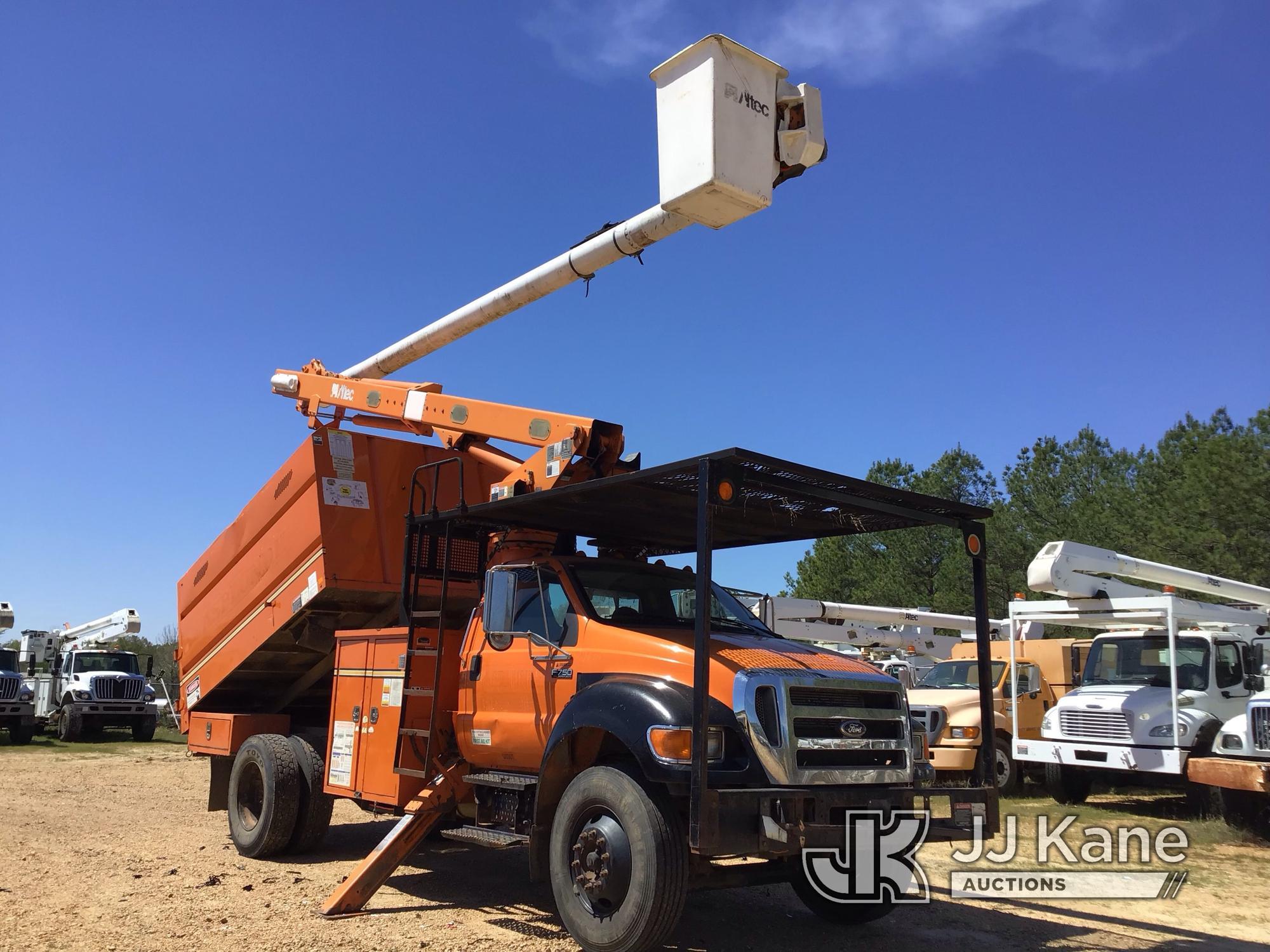 (Byram, MS) Altec LRV55, Over-Center Bucket Truck mounted behind cab on 2010 Ford F750 Chipper Dump