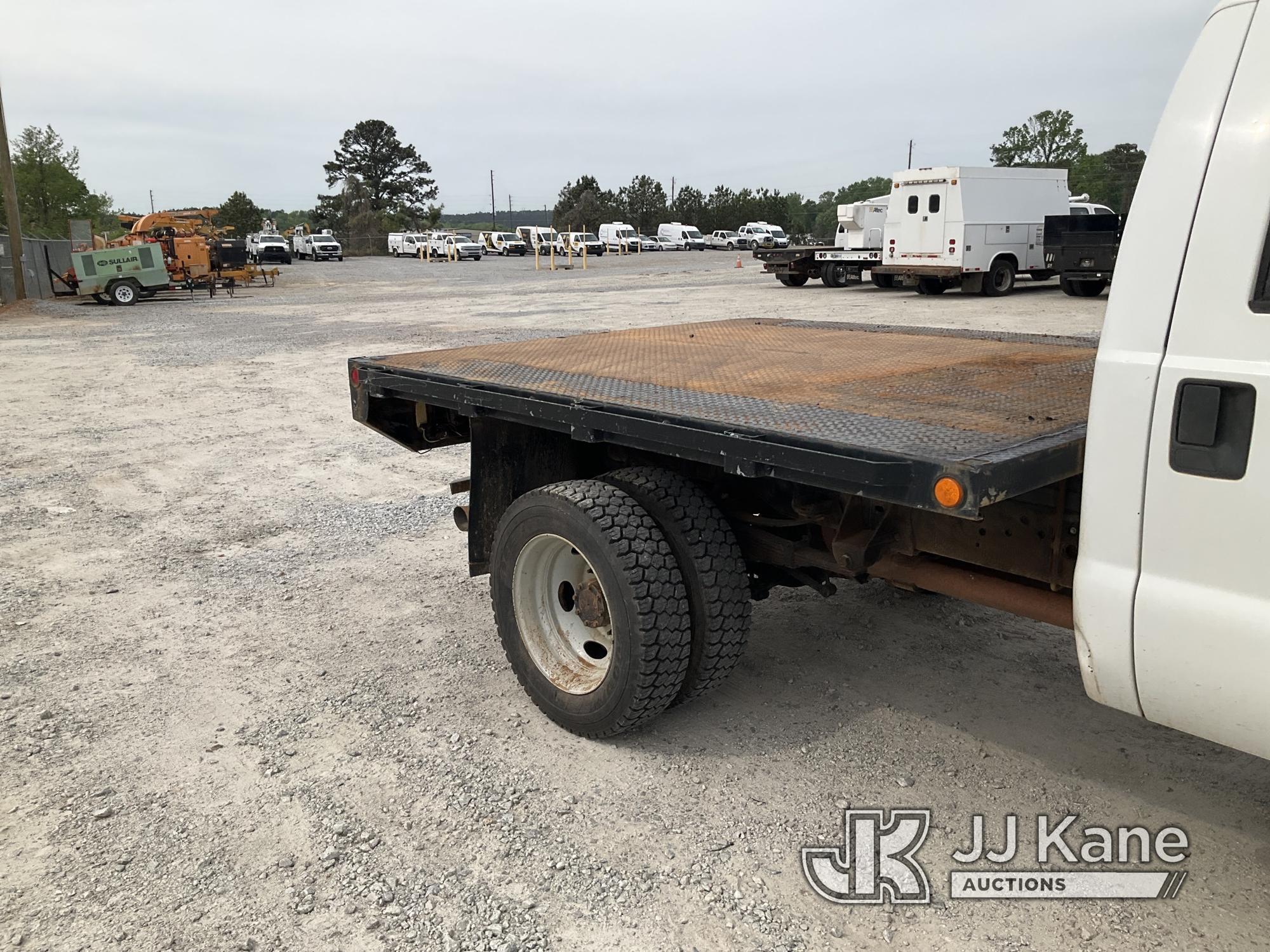 (Villa Rica, GA) 2011 Ford F550 4x4 Crew-Cab Flatbed Truck Runs & Moves) (Jump To Start, Body Damage