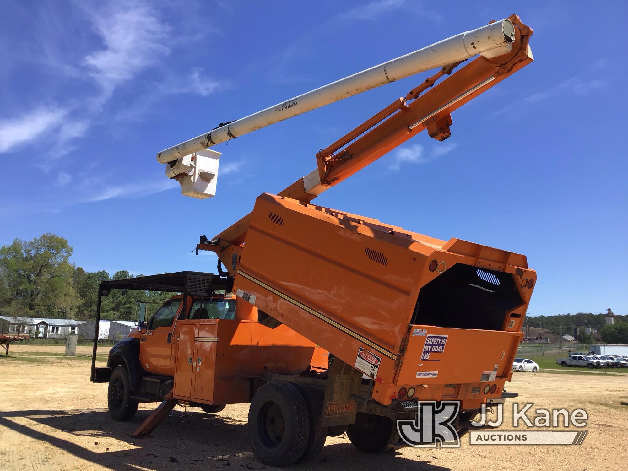 (Byram, MS) Altec LRV55, Over-Center Bucket Truck mounted behind cab on 2010 Ford F750 Chipper Dump