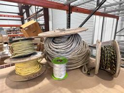 (4) SPOOLS OF PULL ROPE AND WOODEN BIN WITH ASSORTED ELECTRICAL PARTS AND HARDWARE