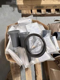 PALLET OF ASSORTED PLUMBING PARTS; FAUCET PIPE STANDS; AND WASHING MACHINE OUTLET BOXES