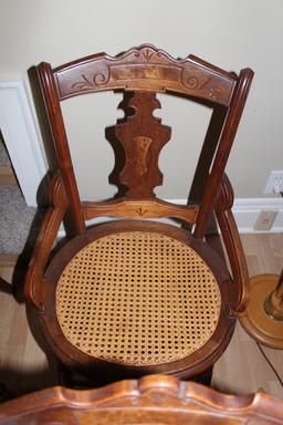 Set of 6 hip hugger Victorian walnut cane bottom chairs some rough caning