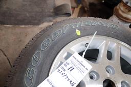 SET OF GOODYEAR WRANGLER ST TIRES W/ ALUMINUM RIMS 225 75R 16, WOULD FIT ON A JEEP