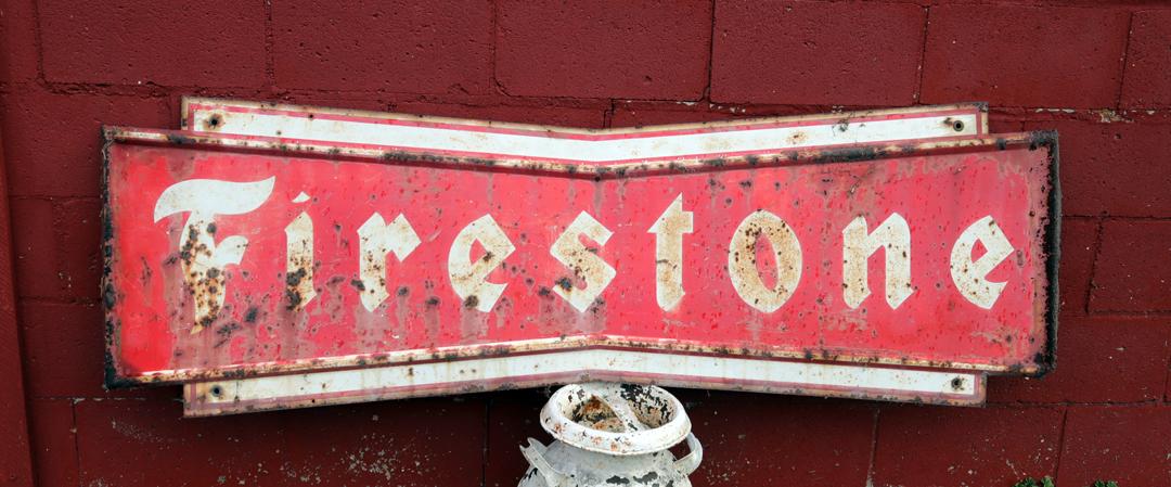 FIRESTONE TIN SIGN 72X23, ORIGINAL BUT HAS RUST