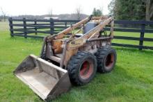 Melroe Bobcat M-610 skid loader w/ 4 cyl gas engine, 60" materials bucket & manure fork bucket , is 