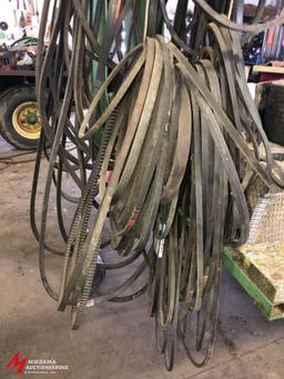 ASSORTED DRIVE BELTS, INCLUDES NEW AND USED, VARIOUS SIZES AND TYPES.