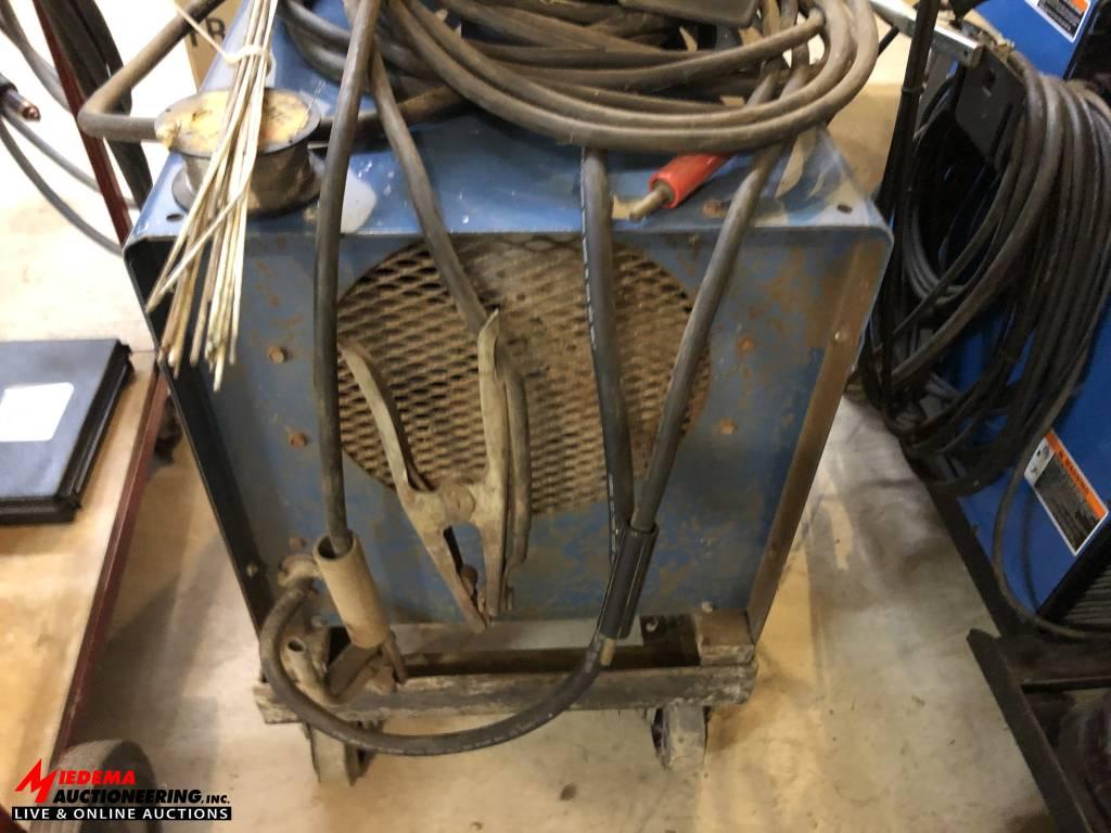 MILLER DIALARC 250P AC/DC ARC WELDER WITH LEADS AND ASSORTED WELDING ROD. 200/230/460 VOLT SINGLE PH