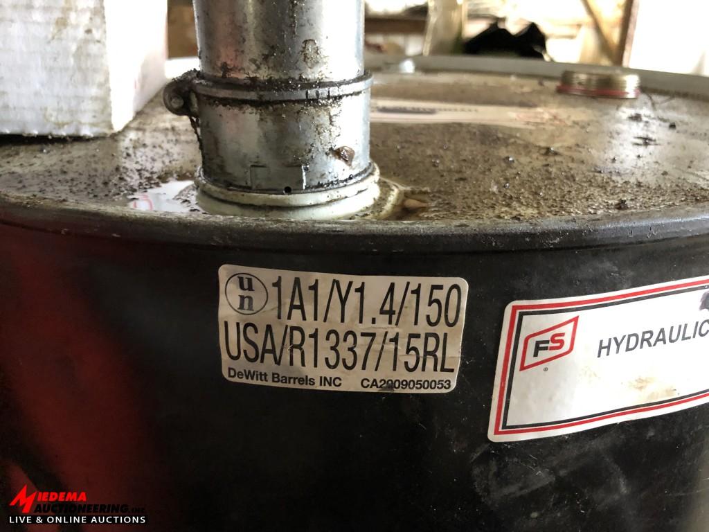 HYDRAULIC TRANSMISSION & WET BRAKE OIL IN 55-GALLON DRUM WITH PUMP, APPROX 1/2 FULL