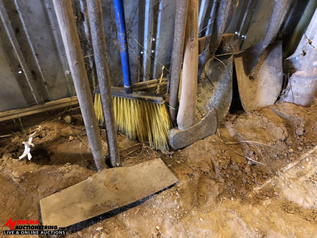 ASSORTED SHOVELS, SLEDGE HAMMER, AXE, RAKE, POST HOLE DIGGER, BROOM