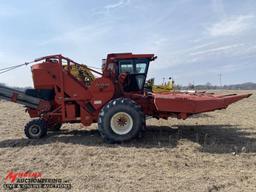 NEW IDEA 800 HARVESTER, UNISYSTEM, BYRON 1436CF CORN HEAD, 1047 HOURS SHOWING, BYRON 2400 CONVEYOR