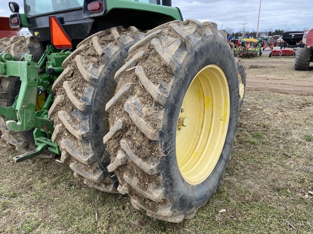 JOHN DEERE 4850 TRACTOR, 4WD, 3PT WITH QUICK HITCH, PTO, 2-REMOTES, 18.4R42 REAR DUALS, 16.9R28 FRON