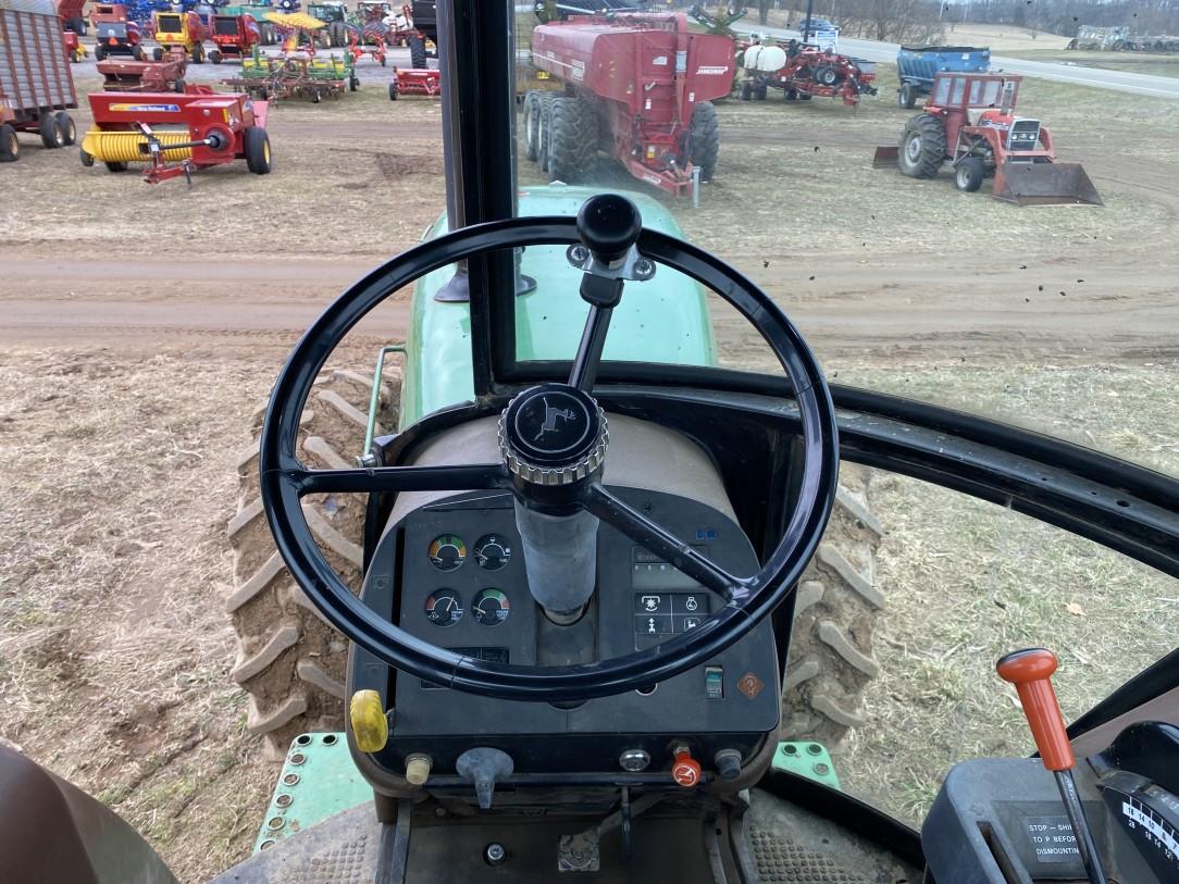 JOHN DEERE 4850 TRACTOR, 4WD, 3PT WITH QUICK HITCH, PTO, 2-REMOTES, 18.4R42 REAR DUALS, 16.9R28 FRON