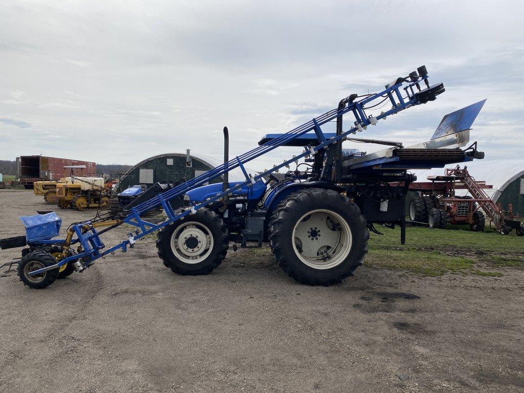 NEW HOLLAND TB110 TRACTOR, MFWD, LAKEWOOD CELERY HARVESTER, 18.4-38 REAR DUALS, 14.9-28 FRONT TIRES,