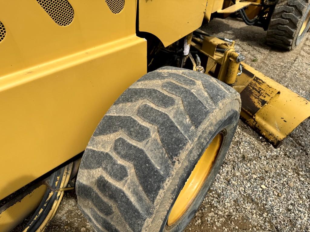 2003 PSI M413XT MOTOR GRADER, 120'' GRADE BLADE, 80'' FRONT BUCKET, HAS SKID STEER MOUNT, OROPS, 4X4