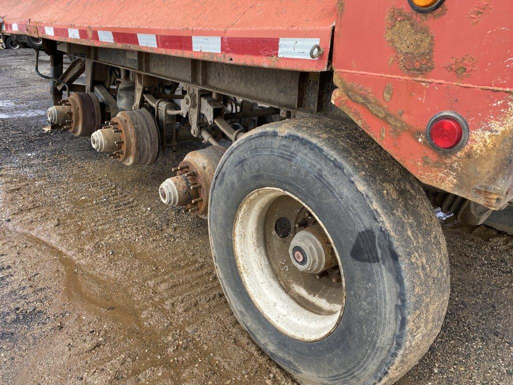 2004 J&J QUAD AXLE LEAD RUBBLE TUB, TRAILER ROLLED OVER, FRAME IS BENT, BOX APPEARS GOOD, MISSING MO