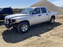 2011 DODGE DAKOTA 4-DOOR PICKUP TRUCK, 3.7L V6 GAS ENGINE, AUTO TRANS, 4WD, PW, PL, PM, AM-FM RADIO, SHORT BOX, HAS FRONT END DAMAGE, RUST HOLES SHOWING, CHECK ENGINE LIGHT IS ON, 246,337 MILES SHOWING, VIN: 1D7RW3GK4BS701796