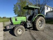 DEUTZ 7085 TRACTOR, 2WD, CANOPY, 3PT, NO TOP LINK, 540 & 1000 PTO, 2-REMOTES, 18.4-34 REAR TIRES, (12) FRONT WEIGHTS, 7642 HOURS SHOWING, S/N: 74346066