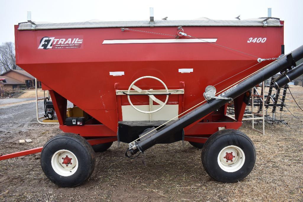 E-Z Trail 3400 dual compartment gravity wagon with 14' hyd. drive auger