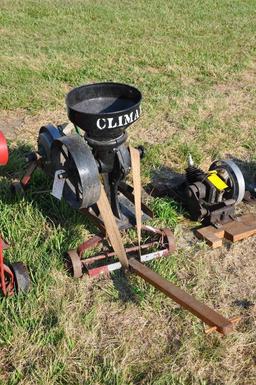 Maytag single-cylinder engine w/ Climax grinder mounted on steel wheel truck