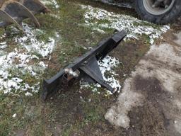 Skidsteer plate with hitch and ball hitch.