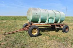 1,000 gal. poly tank on running gear