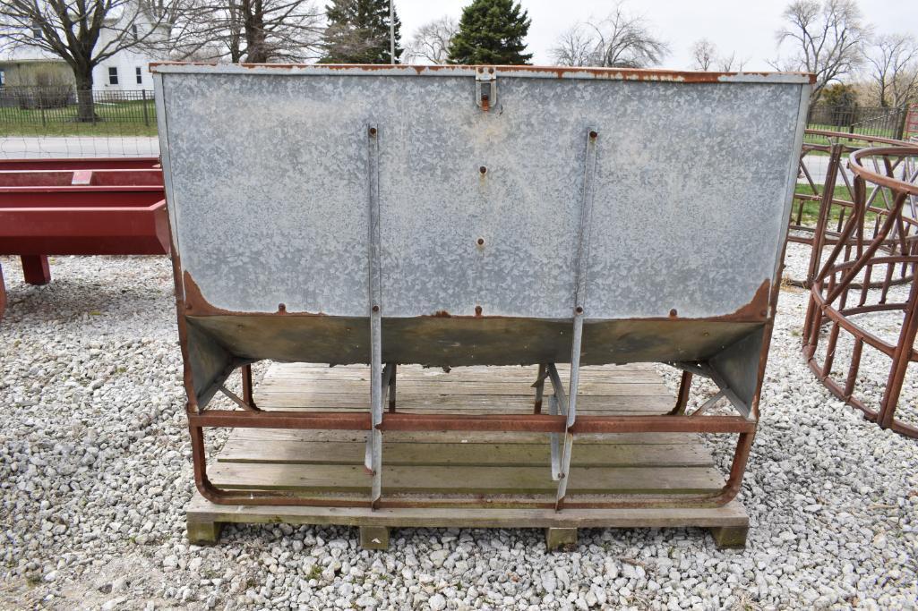 Calf creep feeder on wood skid