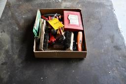 Box of wire brushes and knives