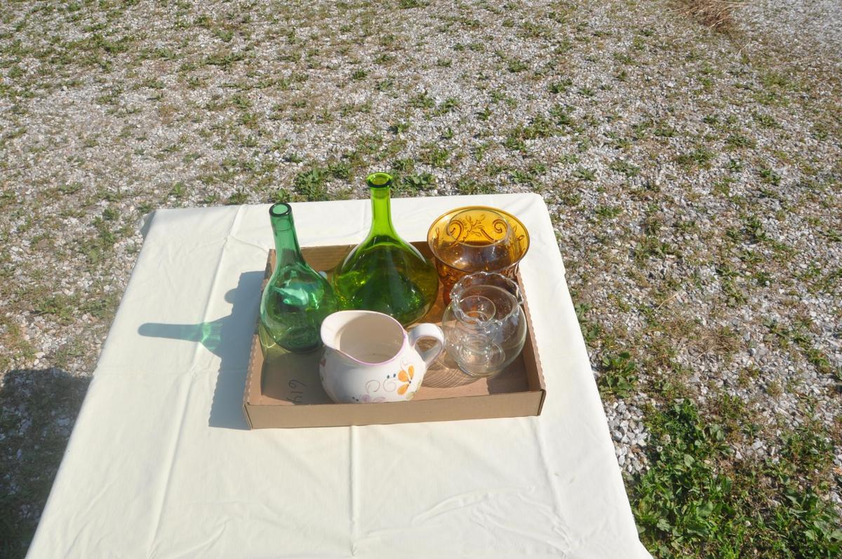 various bottles, and flower planters