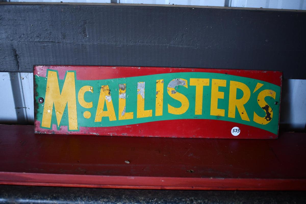 McAlli;ster's double sided tin sign
