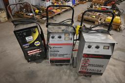 (2) Schumacher battery chargers & (1) Napa battery charger