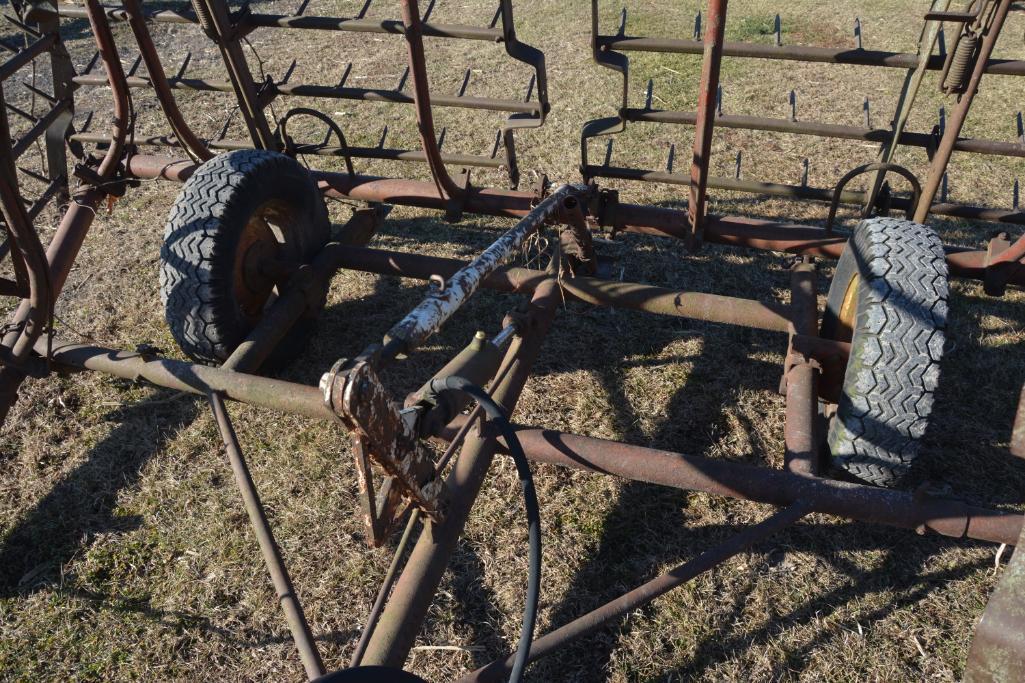 24' (4) section harrow on IH cart