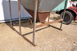 Galvanized feed hopper on steel skid