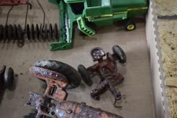 Flat of older machinery toys