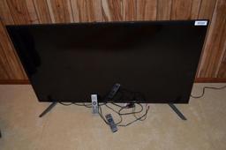 54" Sceptre flatscreen TV & sound bar & 2 non-matching remotes