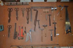 Contents on (2) large peg boards, tools to include: hammers, crow bars, tin snips, ext. cords, hand